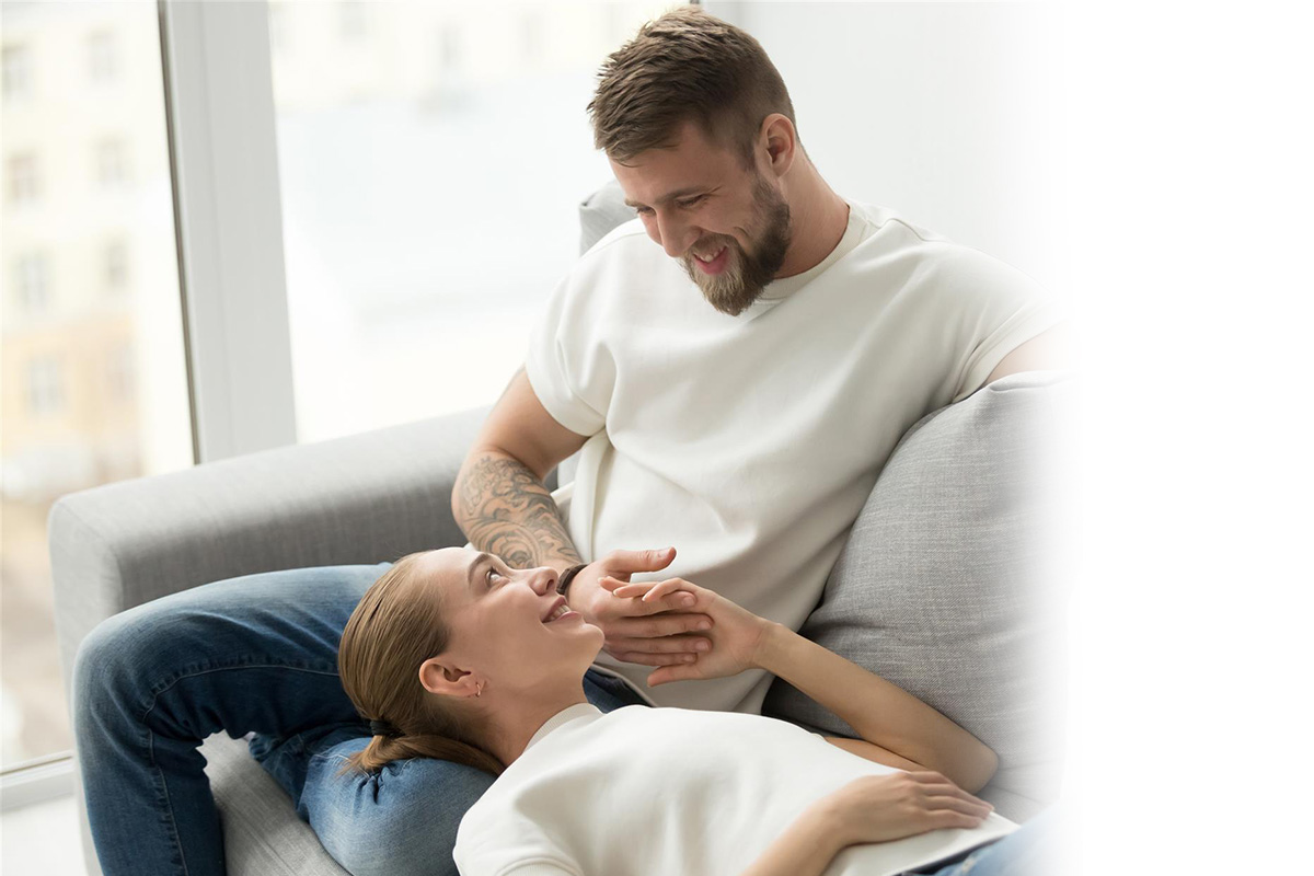 couple laying on the couch